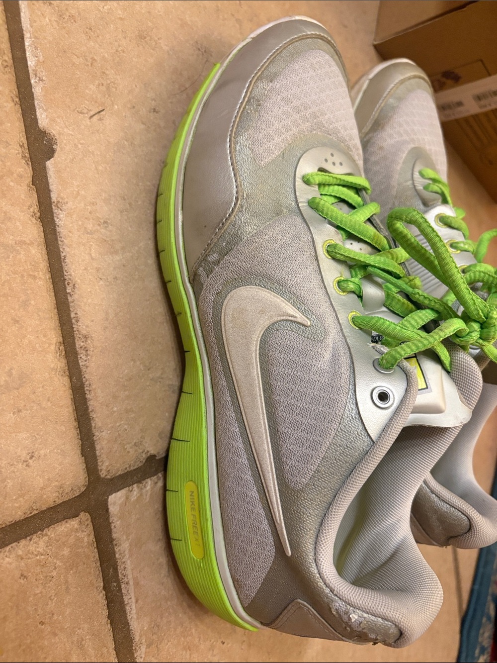 Nike womens Gray Athletic Shoes with Neon Green Accents size 8.5